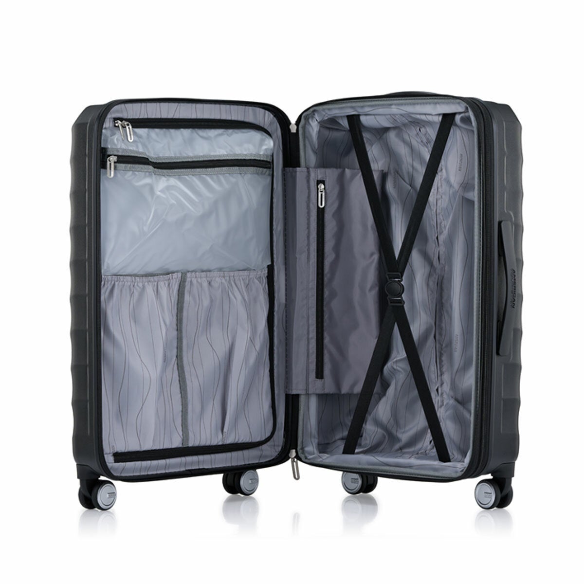 Expandable Hard Shell Suitcase Trio with Dual Spinner Wheels and Adjustable Trolley Grip by American Tourister — image 14