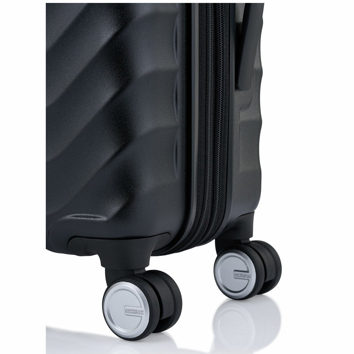 Expandable Hard Shell Suitcase Trio with Dual Spinner Wheels and Adjustable Trolley Grip by American Tourister — image 23