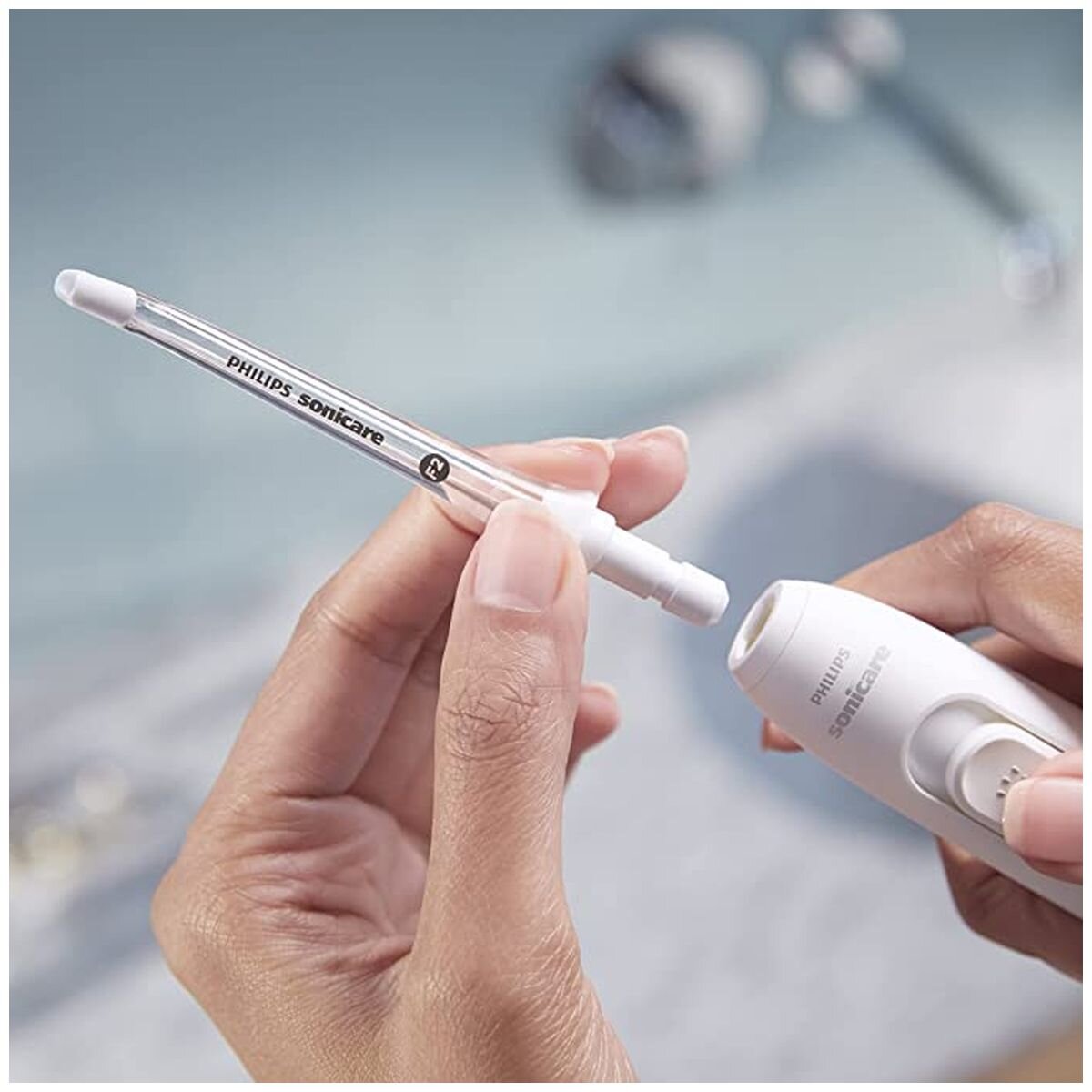 Philips Sonicare Power Flosser 7000 - QuadStream Nozzle, Pulse Wave, Whisper-Quiet Design - HX3911-42