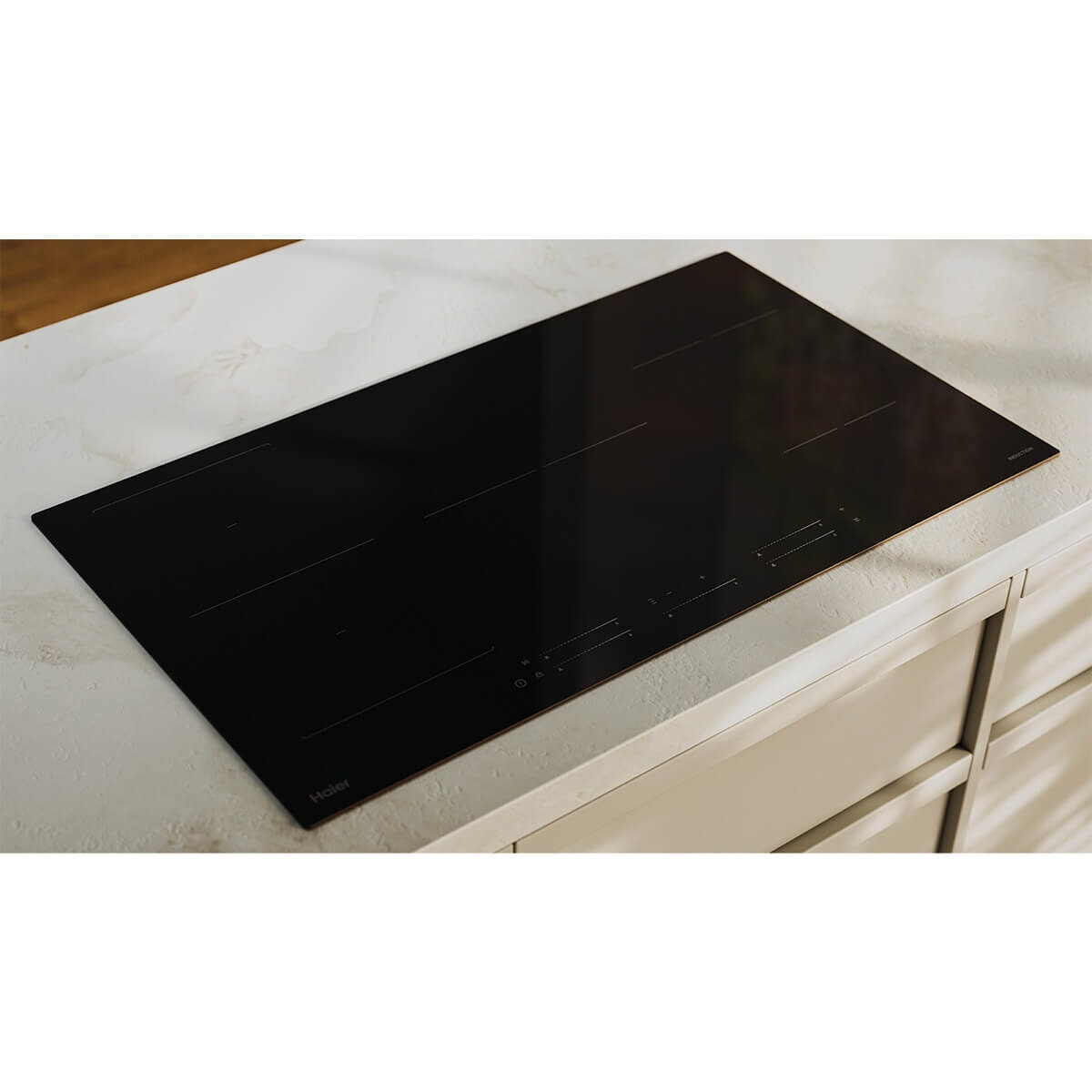 Haier 90cm 500 Series induction cooktop - five zones with Flexi Zone - black glass - HCI905FTB4
