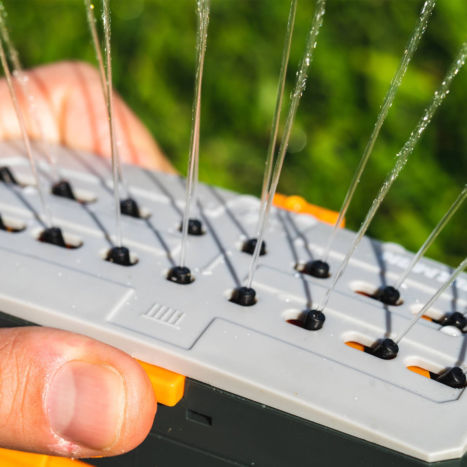 Holman Mini Oscillating Plastic Sprinkler on Weighted Base
