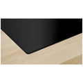 Bosch 70cm Series 6 Induction Cooktop with Downdraft Ventilation - Black Glass, Home Connect - PVQ711H26E