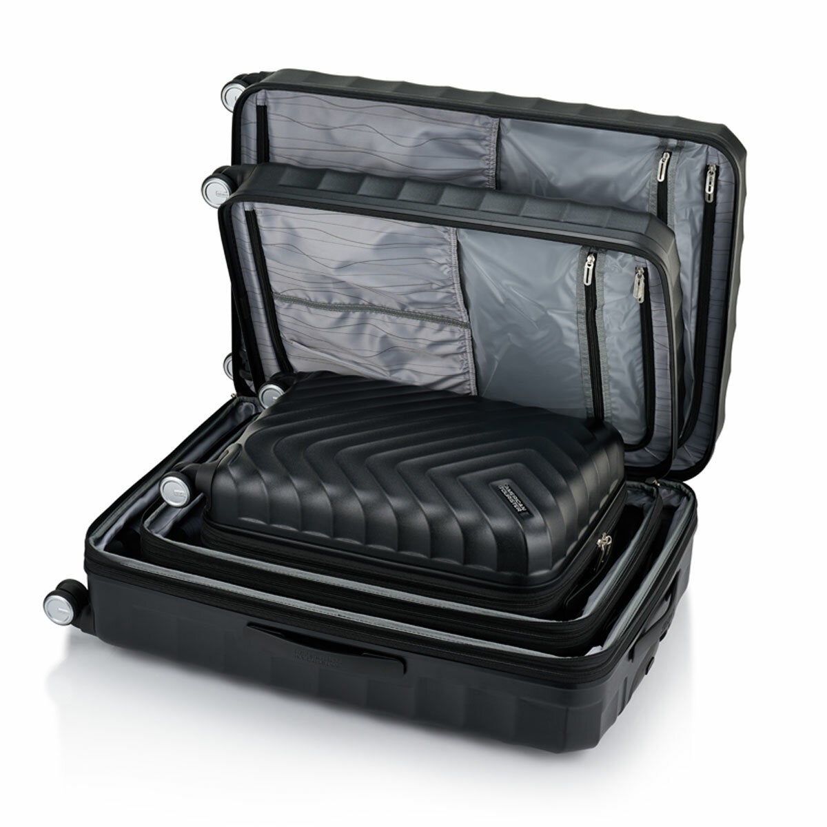 Expandable Hard Shell Suitcase Trio with Dual Spinner Wheels and Adjustable Trolley Grip by American Tourister — image 12