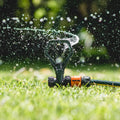 Holman Butterfly Sprinkler on Spike Black/Grey Plastic 4m Coverage
