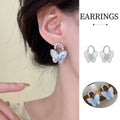 Butterfly Stud Earrings with Pearl-Like Accents, Light Blue