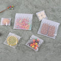 Clear Self-Adhesive Snowflake Cookie Bags - 14 x 14 cm Plus 3 cm - view 5