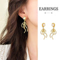 French Retro Gold Tone Long Drop Earrings with Pearl Accent and Swirl Design