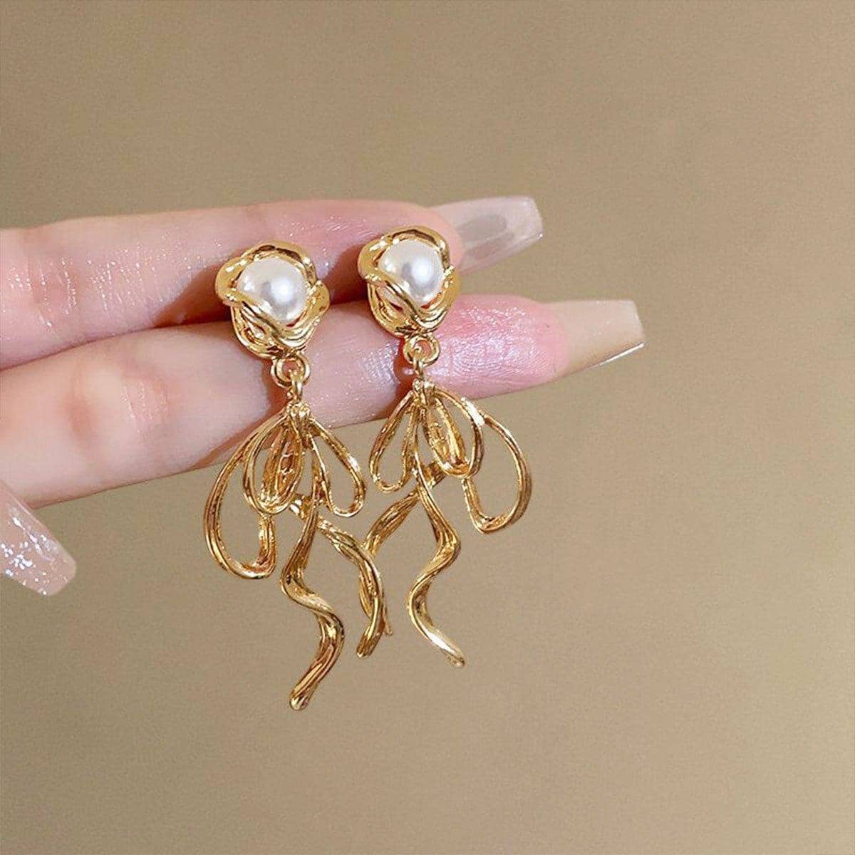 French Retro Gold Tone Long Drop Earrings with Pearl Accent and Swirl Design - view 4