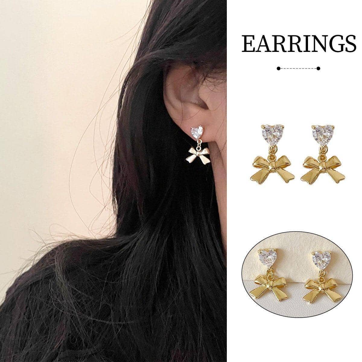 Gold Bow Pendant Earrings with Clear Heart Crystal Top