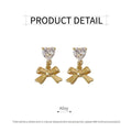 Gold Bow Pendant Earrings with Clear Heart Crystal Top - view 3