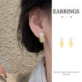 Gold Flower Oval Earrings with Imitation Pearl Accents for Women