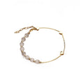 Gold Heart Charm Bracelet with Grey Cat-Eye Beads