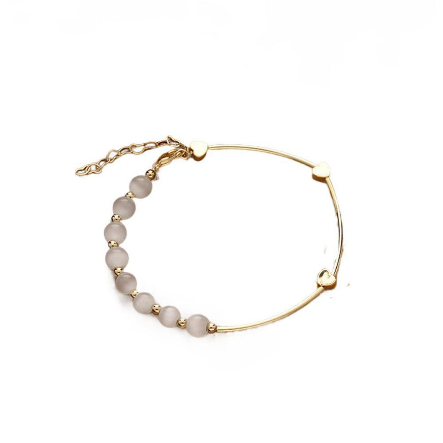 Gold Heart Charm Bracelet with Grey Cat-Eye Beads