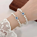 Imitation Pearl Stretch Bracelet with Blue Centre Gemstone - White - view 4