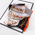 Ladies Silk-Feel Square Scarf, 70 x 70 cm - Orange, Grey and White Tassel and Chain Print